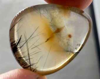 Synchysite,Astrophyllite,and Riebeckite inclusion inside -71 carats