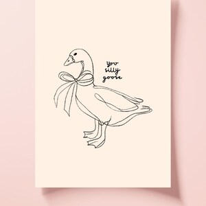 Minimalist line drawing of a goose wearing a bow, with playful handwritten text saying “you silly goose,” set on a soft cream background.