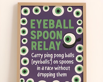 May include: A framed poster with a purple background and the words "EYEBALL SPOON RELAY" in green and white. The poster has a border of green and white eyeballs. The text below reads "Carry ping pong balls (eyeballs) on spoons in a race without dropping them."