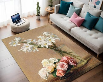 May include: A beige area rug with a floral design featuring white lilies in a glass vase and pink roses. The rug has a vintage aesthetic and is perfect for adding a touch of elegance to any room.