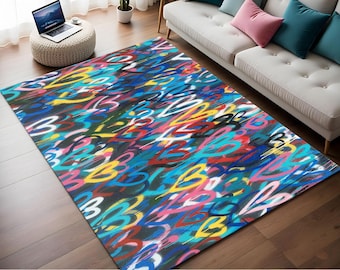Puede incluir: Una alfombra colorida con un patrón repetitivo de corazones en varios colores, incluyendo azul, rosa, amarillo, rojo y negro. Los corazones están dibujados en estilo graffiti.