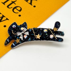 黒猫のブローチ、キラキラ輝くクリスタルの猫のピン、天体の星、気まぐれな動物のジュエリー、猫好きへのギフト