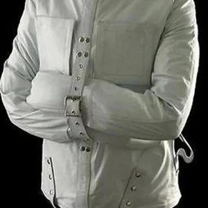 May include: A white straight jacket with long sleeves, a high collar, and multiple straps with buckles. The jacket has two front pockets and is designed to restrain the arms. The garment is made of a sturdy material.