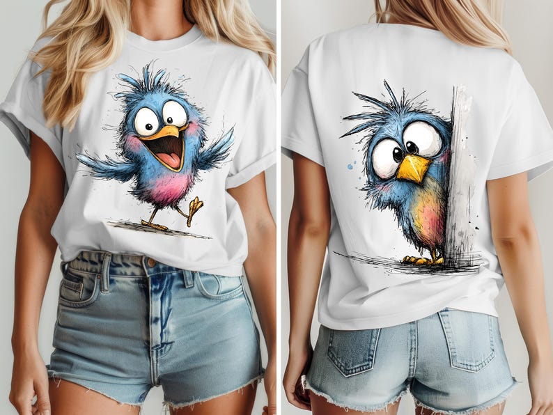May include: White t-shirt featuring a cartoon bird illustration. The front shows a blue bird with pink accents, arms outstretched, and a wide open mouth. The back of the shirt displays a similar bird peeking from behind a wall.