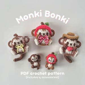Puede incluir: Figuras de monos de ganchillo en varios tamaños y estilos, incluyendo uno con sombrero de vaquero y otro con sombrero de manzana roja. El texto "Monki Bonki" está encima de las figuras y "PDF crochet pattern" debajo.