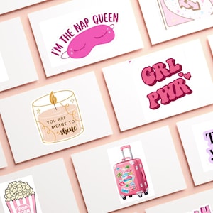 May include: A collection of white cards with pink illustrations and text. The cards feature phrases like "I'm the Nap Queen," "GRL PWR," and "You are meant to shine." Other images include a pink suitcase, a candle, and a coffee cup.