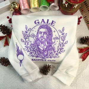 Gale Dekarios BG3 Embroidered Hoodie And Sweatshirt, Gale Baldur&#39;s Gate 3 Embroidered Crewneck With Gale&#39;s Tattoo On Sleeve, BG3 Merch