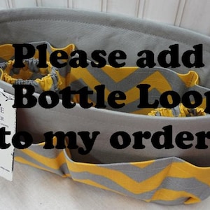 May include: A gray and yellow chevron patterned fabric organizer with multiple pockets. The text "Please add a Bottle Loop to my order" is written in black on the organizer.