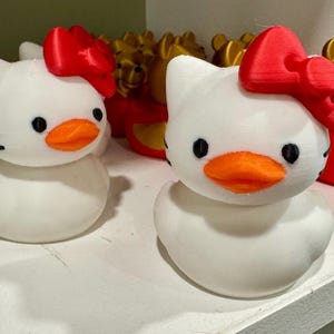 Cute Kitty Bow Duck Figure Toy