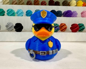 Figura de juguete de pato policía