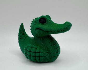 Figura de juguete de pato caimán y cocodrilo
