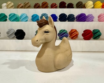 Giocattolo a forma di cavallo e anatra