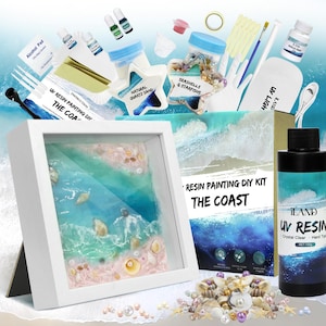 May include: A DIY resin painting kit with the theme "The Coast." The kit includes a framed artwork with seashells, sand, and resin, along with various supplies like UV resin, paint, and tools. The kit also includes the text "UV Resin Painting DIY The Coast."