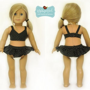 May include: A doll wearing a black and white polka dot bikini with a ruffled skirt. The top is a halter style, and the bottom is a skirted design. The doll has blonde hair and blue eyes. The image includes the text "MyAngieGirl Doll Clothes & Patterns."