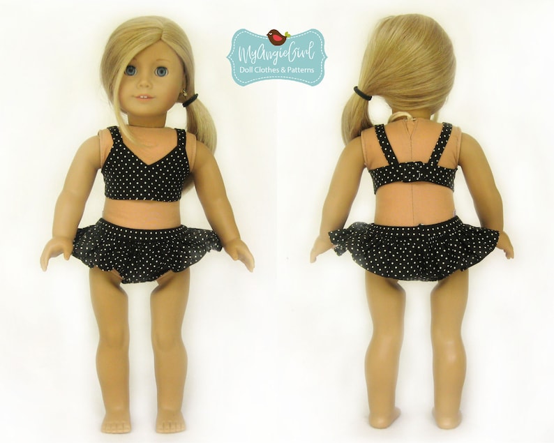 May include: A doll wearing a black and white polka dot bikini with a ruffled skirt. The top is a halter style, and the bottom is a skirted design. The doll has blonde hair and blue eyes. The image includes the text "MyAngieGirl Doll Clothes & Patterns."