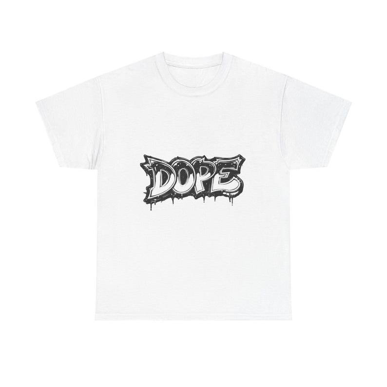 May include: White t-shirt with the word "DOPE" in a black and gray graffiti-style font. The word has a dripping effect, adding to the urban aesthetic. The shirt is a casual wear item.