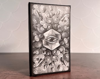 May include: Black and white illustration of a geometric eye with a swirling pattern around it. The eye is inside a black frame.