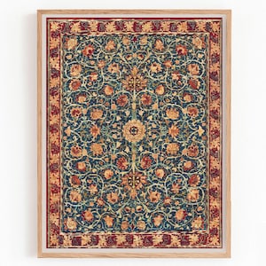 May include: A rectangular wall art print in a light wood frame featuring a dark blue background with an intricate pattern of orange and red floral motifs, swirling vines, and a central medallion, enclosed by a decorative red and gold border.