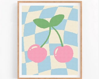 May include: A framed print of two pink cherries with green stems on a blue and white checkered background.