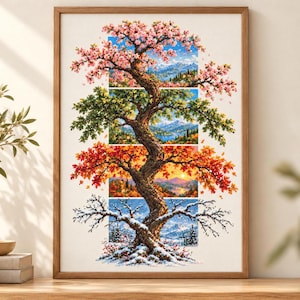 May include: A framed wall art print featuring a central twisted tree trunk that transitions through four distinct seasonal landscapes, showing pink spring blossoms, green summer leaves, orange autumn foliage, and snow-covered winter branches.