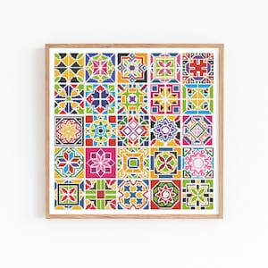 May include: A framed artwork featuring a grid of colorful, geometric tile patterns. Each tile showcases a unique design with vibrant hues of red, yellow, blue, green, and pink. The artwork is encased in a light brown wooden frame.