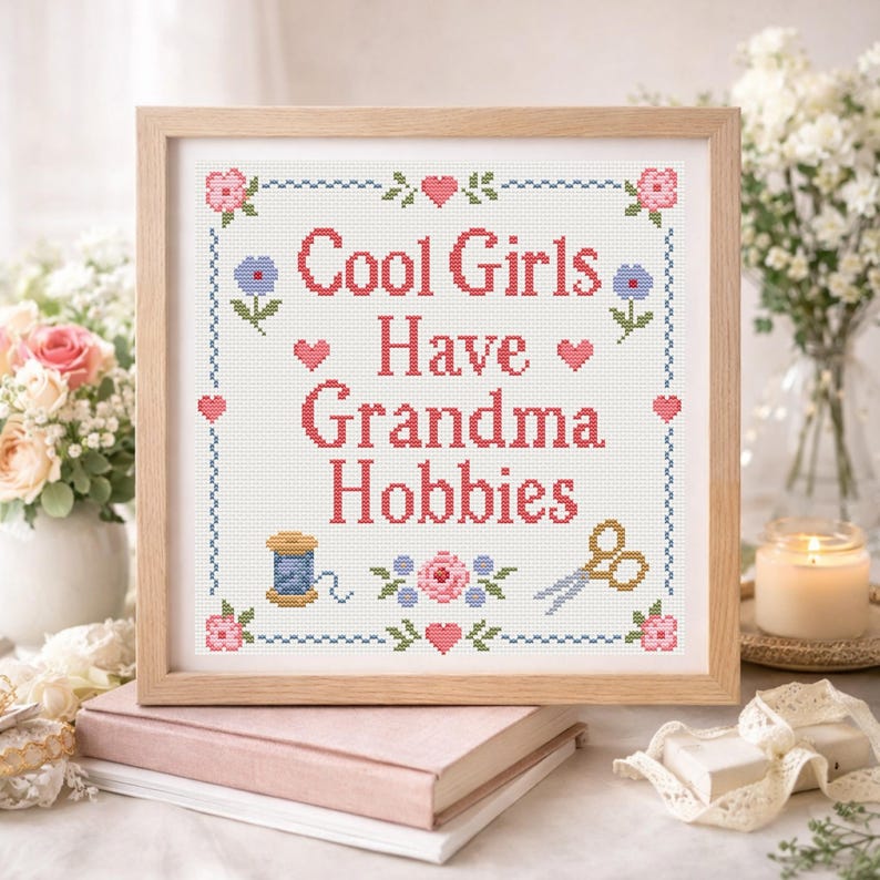 Hot girls Have Grandma Hobbies This funny cross stitch pattern PDF features the phrase Cool Girls Have Grandma Hobbies in a classic stitched lettering style with a cozy vintage sampler look. The design combines soft florals, hearts, scissors, and thread details for a handmade aesthetic that feels both nostalgic and trendy. It is ideal for cross stitch lovers, embroidery fans, craft room decor, and anyone who enjoys slow hobbies, handmade art, and feminine DIY projects with a humorous quote.