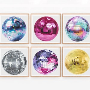 May include: Six framed prints of disco balls in different colors, including silver, gold, pink, and blue. The frames are all the same size and shape, and they are arranged in a grid pattern.