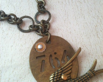 Bird and Gear on a Tag Steampunk Necklace
