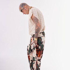 Abstract print harem pants outfit with natural fabric top, slow fashion boho ensemble for art events and festivals
