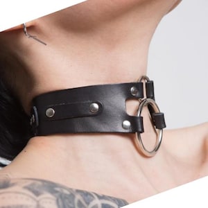 Leather black choker with two metal rings This is an extraordinary gift for you or your girlfriend or friend. She will be delighted