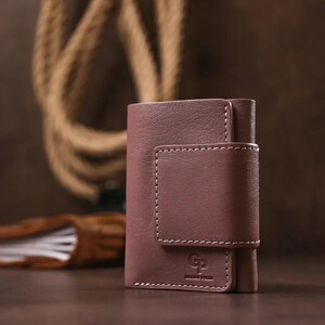 Portefeuille en cuir italien véritable Design universel pour hommes et femmes. Un beau cadeau