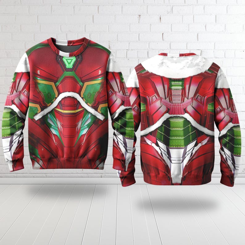 Puede incluir: Una sudadera gr&aacute;fica roja y verde con un dise&ntilde;o futurista. La sudadera presenta un patr&oacute;n detallado con detalles en blanco, verde y dorado. El dise&ntilde;o se repite en la parte delantera y trasera de la sudadera.