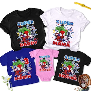 May include: A white ceramic mug with a black handle and the text "But First, Coffee" in a bold, black font. The mug is set against a blurred background, suggesting a cozy setting.