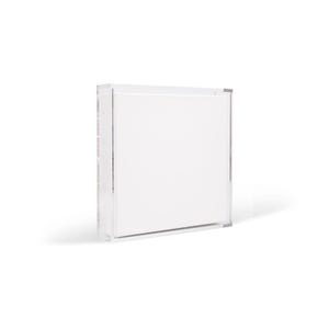 May include: A square, clear acrylic display box featuring a transparent frame and a solid white interior panel. The object has a clean, geometric design with visible corner joints and a smooth, reflective surface on all sides of the outer casing.