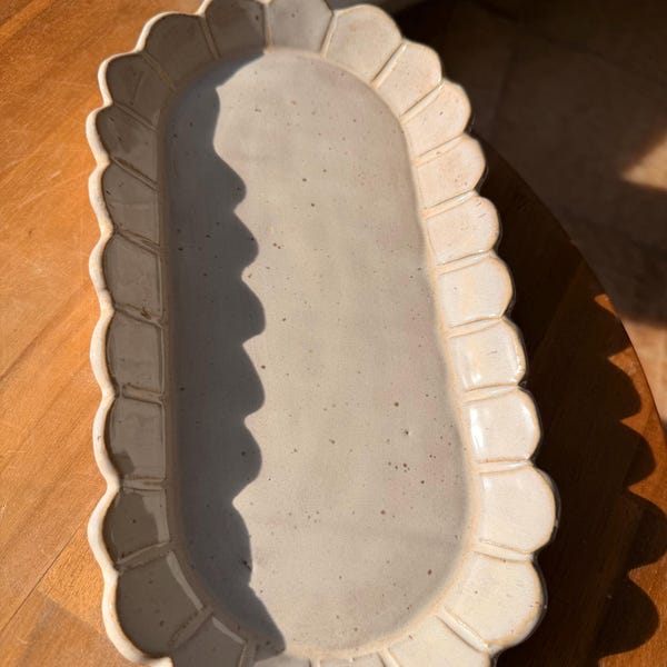 Handmade, scalloped platter in milky white