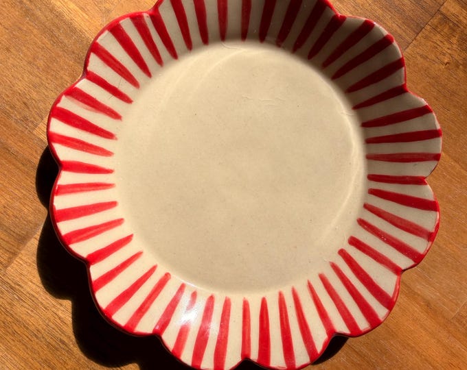 French-inspired red striped dessert plate with hand painted scalloped rim.