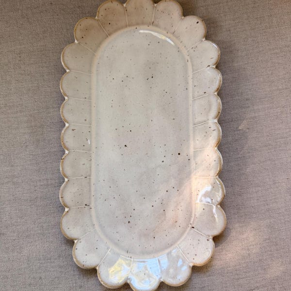 Handmade, scalloped platter in milky white