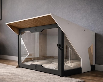 Könnte beinhalten: Ein modernes Haustierhaus mit einem weißen Schrägdach, einem schwarzen Metallrahmen und klaren Glastüren. Im Inneren befindet sich ein weiches, gestepptes weißes Kissen. Die Struktur hat eine Unterseite in Holzoptik am Dach.