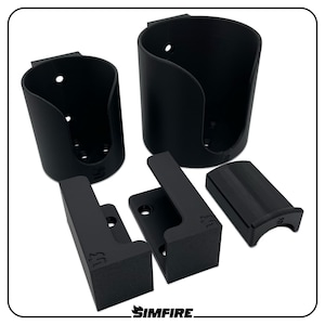 May include: Set of black plastic cup holders for mounting on a wall or surface. The holders are designed to hold standard-sized cups and feature a simple, modern design.