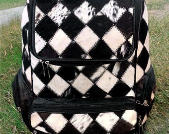 Mochila exótica de patchwork de piel de vaca tricolor: mochila de cuero con pelo hecha a mano.