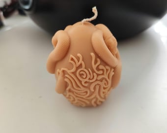 Natural soy wax scented candle: egg with snake, hazelnut scent