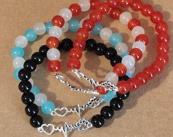 Paws Of Hope: handmade Bracelets with elastic bands and glass beads for pet lovers