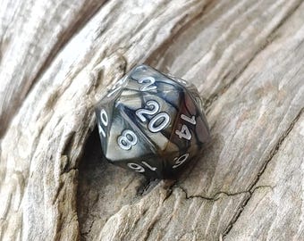 The Beauty of the Forge: Gunmetal and Steel Banded Resin D20 Dice