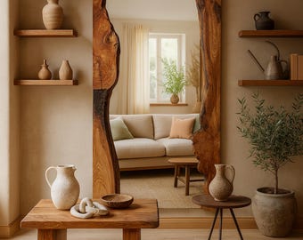 May include: A large, rectangular mirror with a live edge wooden frame. The mirror reflects a living room with a beige sofa, wooden tables, and decorative items. The room has a neutral color palette with natural textures and elements.