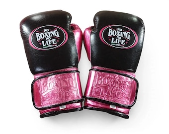 May include: A pair of black and metallic pink boxing gloves featuring the text NO BOXING NO LIFE on the wrist strap and a circular logo on the back of the hand. Each glove has a small white tag on the wrist strap indicating a weight of 10oz.