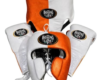 May include: A set of boxing equipment featuring two white boxing gloves and a headgear, all split into orange and white sections. Each piece displays a black oval patch with the text NO BOXING NO LIFE and the phrase HECHO EN MEXICO.