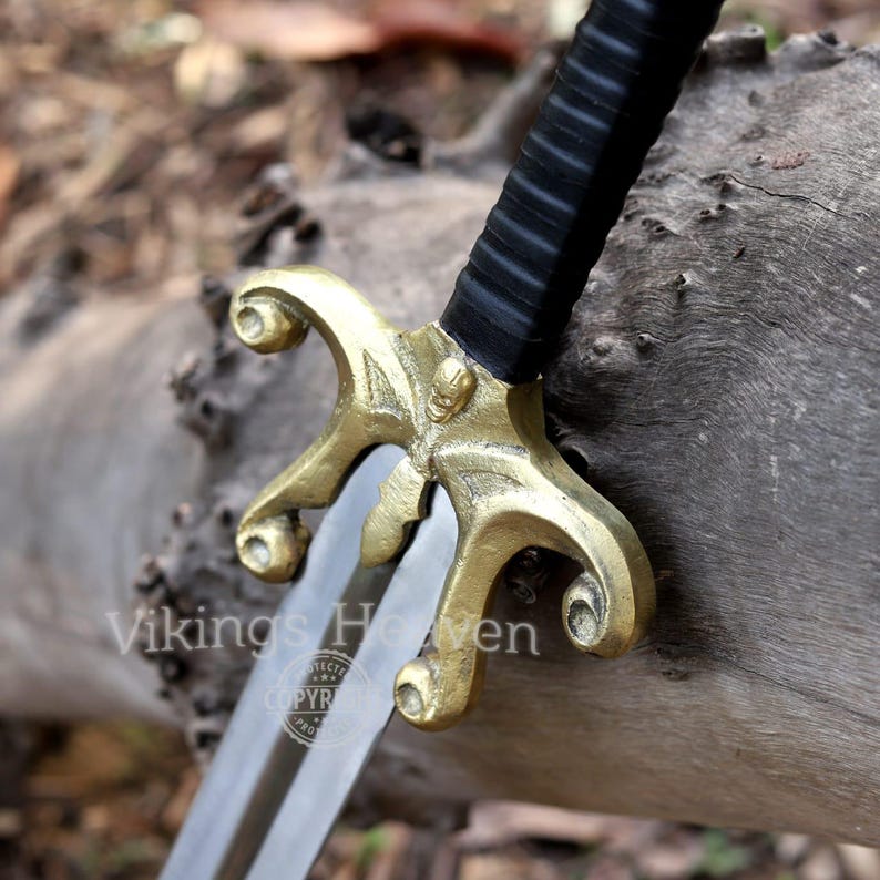 Fully handmade He-Man Power Sword replica with a carbon steel blade, solid brass guard and pommel, inspired by the Masters of the Universe movie. High-quality fantasy sword perfect for cosplay, display, or as a collectible gift for fans of classic 80s heroes.