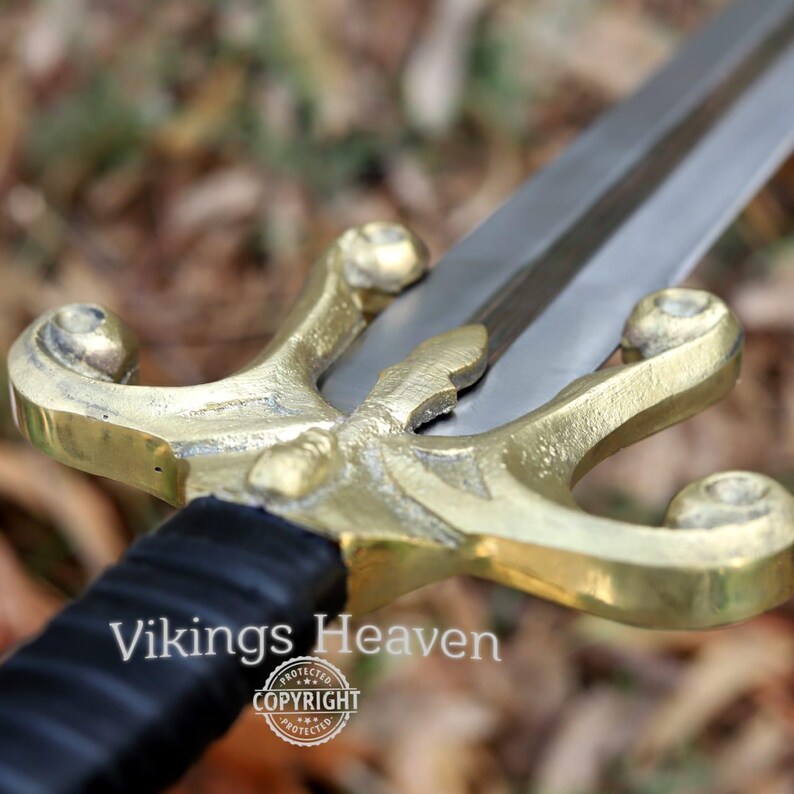 Fully handmade He-Man Power Sword replica with a carbon steel blade, solid brass guard and pommel, inspired by the Masters of the Universe movie. High-quality fantasy sword perfect for cosplay, display, or as a collectible gift for fans of classic 80s heroes.