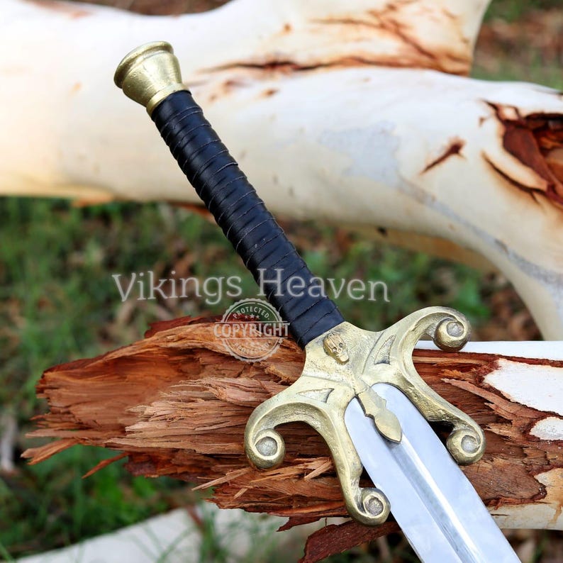 Fully handmade He-Man Power Sword replica with a carbon steel blade, solid brass guard and pommel, inspired by the Masters of the Universe movie. High-quality fantasy sword perfect for cosplay, display, or as a collectible gift for fans of classic 80s heroes.