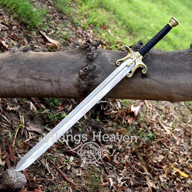 Fully handmade He-Man Power Sword replica with a carbon steel blade, solid brass guard and pommel, inspired by the Masters of the Universe movie. High-quality fantasy sword perfect for cosplay, display, or as a collectible gift for fans of classic 80s heroes.
